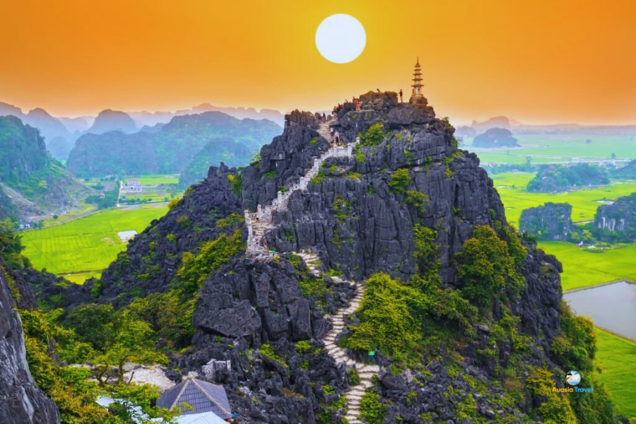 Mua Cave viewpoint with limestone mountains at sunset Ninh Binh Vietnam – Auasia Travel